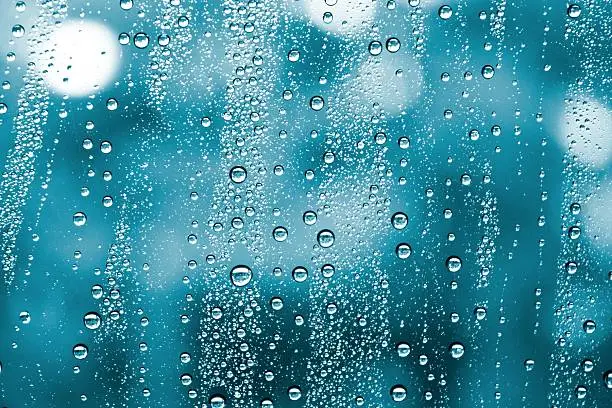 Photo of wet window water drops background
