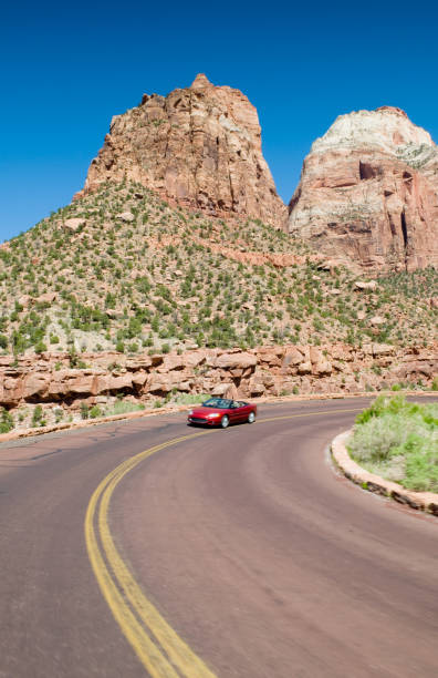 istock Convertible car driving through Zion National Park 157507748