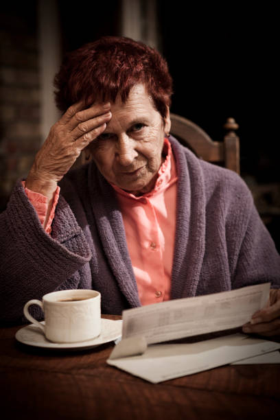 istock Distressed Senior Woman with Bills 157507774
