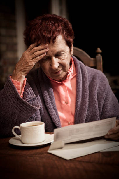 istock Distressed Senior Woman with Bills 157507803