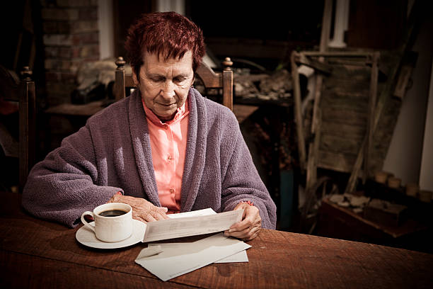 istock Distressed Senior Woman with Bills 157507823