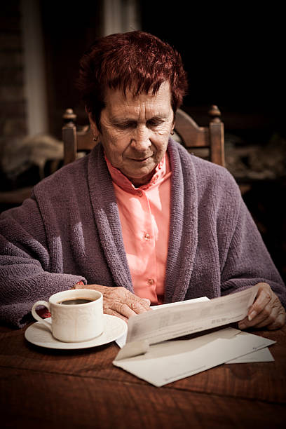 istock Distressed Senior Woman with Bills 157508080