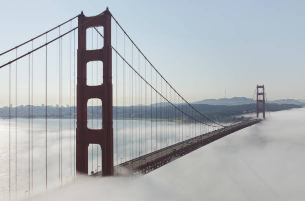 istock Golden Gate Bridge with fog flowing in from Pacific ocean 157508123