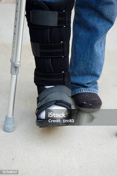 Mature Man On Crutches Stock Photo - Download Image Now - 55-59 Years, Adult, Adults Only