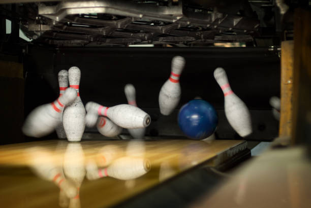Bowling Pin Action http://www.sporthallensbowling.se/istock/bowling.jpg bowling strike stock pictures, royalty-free photos & images