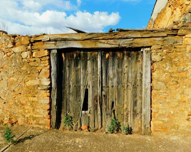 istock ancient door in rural landscapes 1575082204