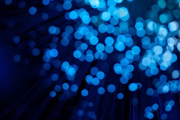 Photo of Abstract image of blue defocused background lights