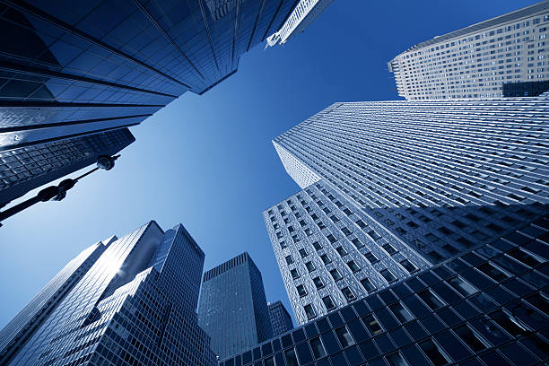istock manhattan skyscraper sun reflecting in facade 157508419