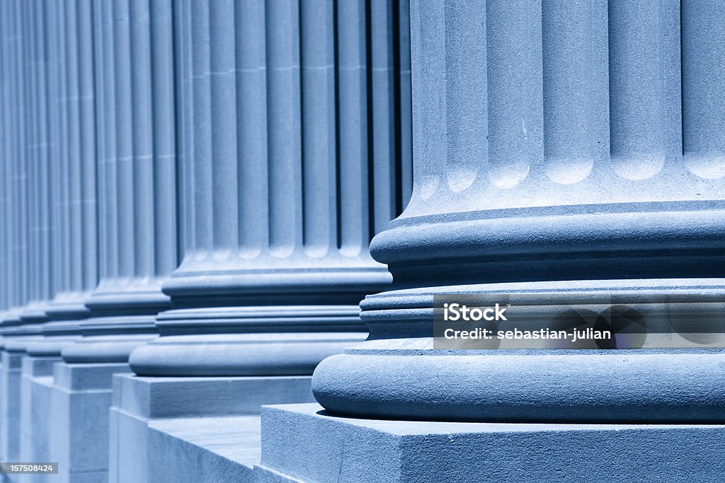 group of corporate blue business columns XXXL - wonderful columns in front of the new york city court house - blue filter treatment - shallow depth of field - focus at first column - camera canon 5D mark II - unsharped RAW - adobe colorspace Justice - Concept Stock Photo