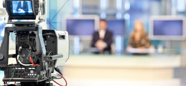 Digital camera recording speech at media event. Live streaming concept.
