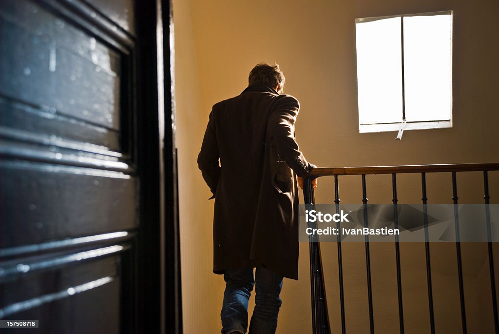 Man leaves home and goes downstairs  A young man seen from behind is going down a staircase in an old typical parisian building. Open door in the foreground.
same at night :
[url=http://francais.istockphoto.com/search/lightbox/3727787&refnum=rachwal81][img]http://img826.imageshack.us/img826/4136/silhouettesshadows.jpg[/img][/url]
[url=file_closeup.php?id=11245220][img]file_thumbview_approve.php?size=1&id=11245220[/img][/url] Men Stock Photo