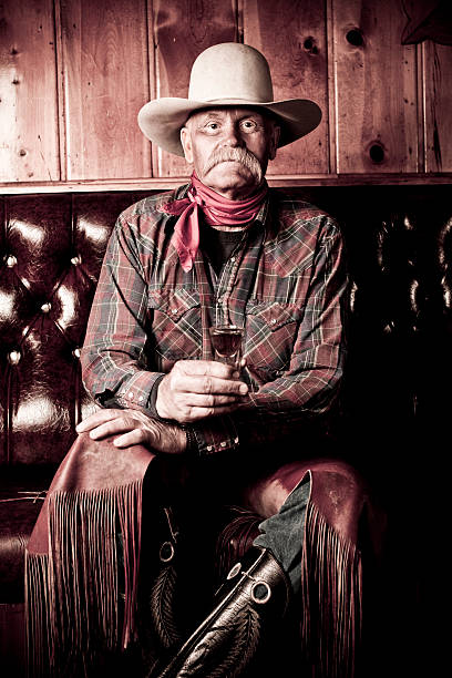 Cowboy Genuine wrangler having a drink jackson hole photos stock pictures, royalty-free photos & images