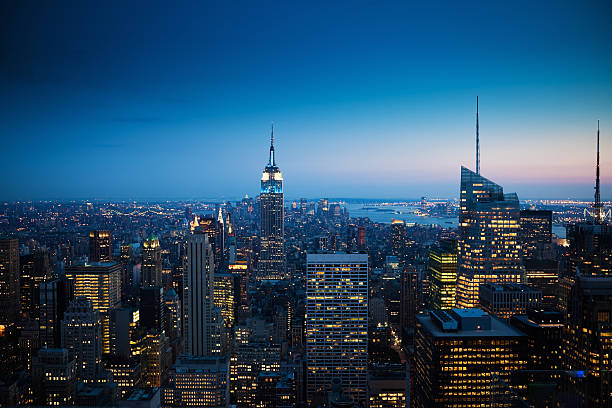 манхэттен нью-йорк сити закате - new york city new york state manhattan night стоковые фото и изображения