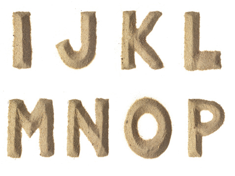 I-J-K-L-M-N-O-P alphabet sand letters.
