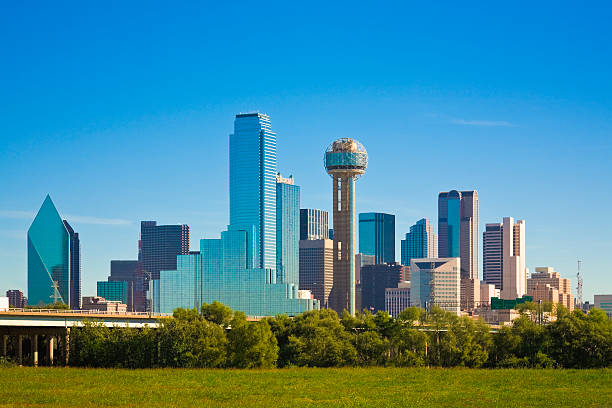 Dallas city skyline, Texas Dallas city skyline, Dallas, Texas, reflections on right side of buildings, full skyline, plenty of copy space top and bottom dallas texas photos stock pictures, royalty-free photos & images
