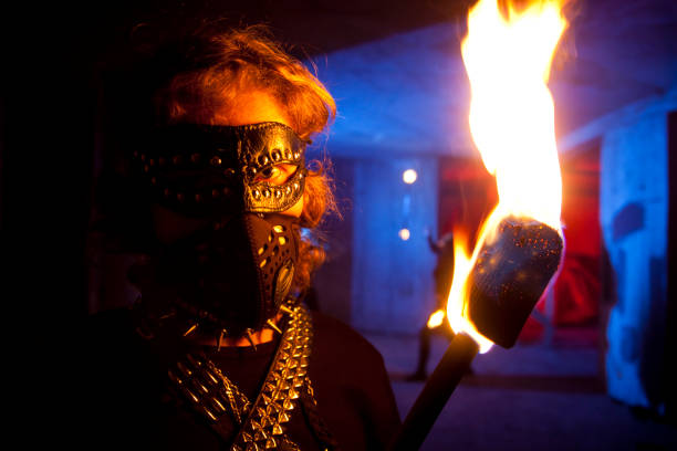 istock Brutal man with torch in abandoned building 157509103