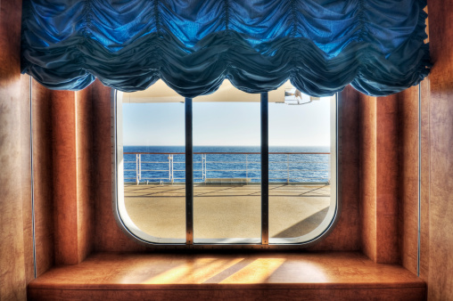 Looking out the window of a cruise ship. High dynamic range photo.