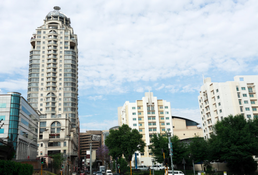 Showing the Michelangelo towers, City bank on the left and the Holiday Inns hotels on the right. Sandton City in the northern suburbs of Johannesburg, South Africa.
