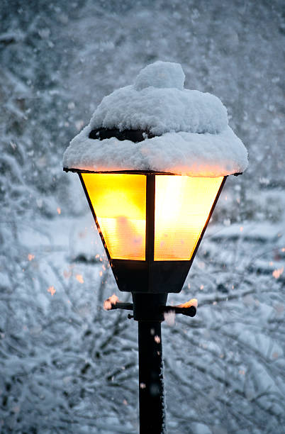 istock streetlamp in winter 157509450
