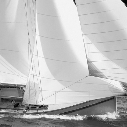  A traditional Cornish sailing boat photographed while racing. Black and White with film grain.