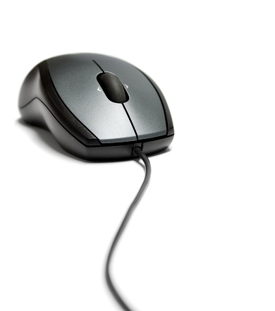 Computer mouse on white background. Close-up. Selective focus.