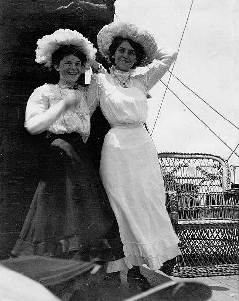 Edwardian Girls Old Photograph Vintage photograph of two happy young women from the Edwardian period, circa 1910. femininity photos stock pictures, royalty-free photos & images