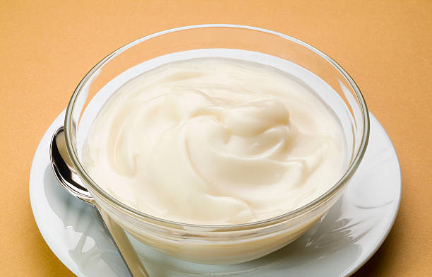 Sweet cream with milk stock photo