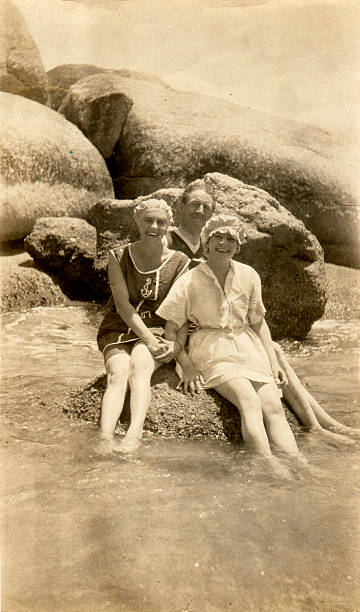 Edwardian Family on Holiday at the Beach  one piece swimsuit photos stock pictures, royalty-free photos & images