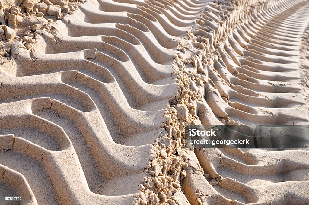 Máquina Imprints en arena - Foto de stock de Solar de construcción libre de derechos