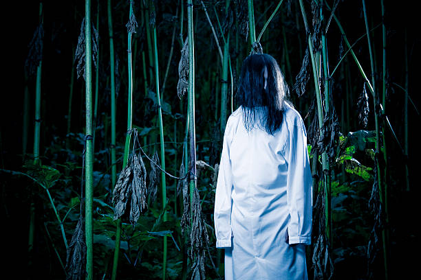 istock Strange creature with long hair in dark forest 157511186