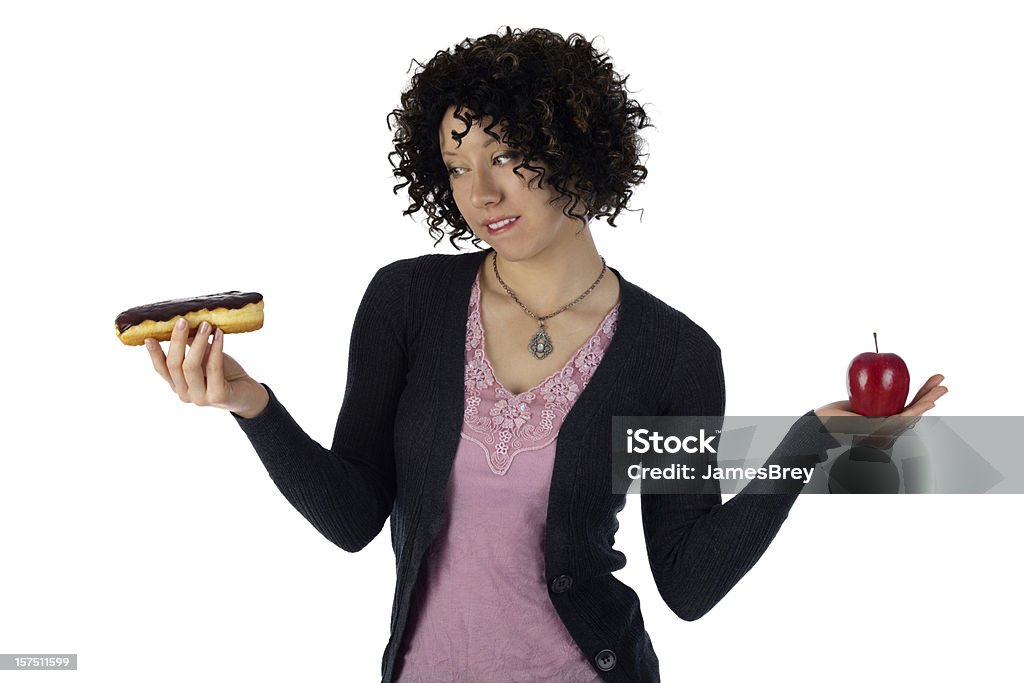Frau mit einem Gewicht von gesund ernähren, Ernährung Hunger Apple gegen Krapfen und Doughnuts - Lizenzfrei Entschlossenheit Stock-Foto