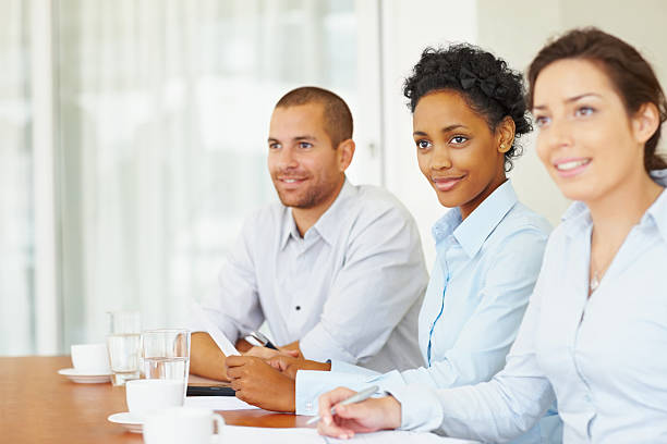 istock Smiling business colleagues during a meeting 157511786