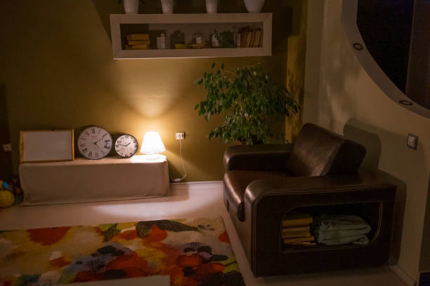 istock Living room at night. 1575118348