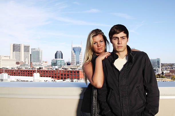 A Beautiful couple having fun outdoors on urban background