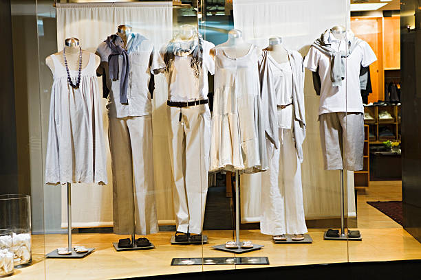 Mannequins in a window display Six mannequins in a window display of a clothing store, wearing casual clothing. mannequin photos stock pictures, royalty-free photos & images