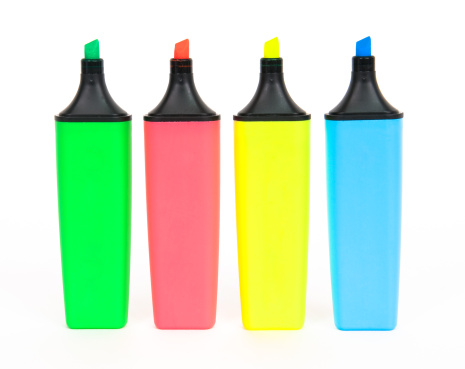 Set of four highlighters on white background