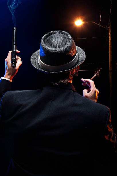 istock Mafia Mob Man With Gun and Cigar 157512432
