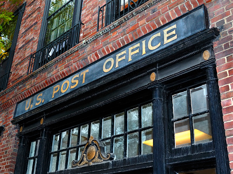 Old Beacon Hill Post Office on Charles Street in Boston, located near the Freedom Trail walking tour. It is a historic location, and so the facade of the building cannot be changed.