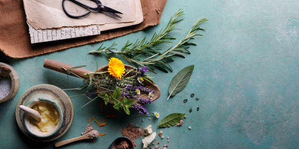 Fresh herbs with scissors and an old recipe