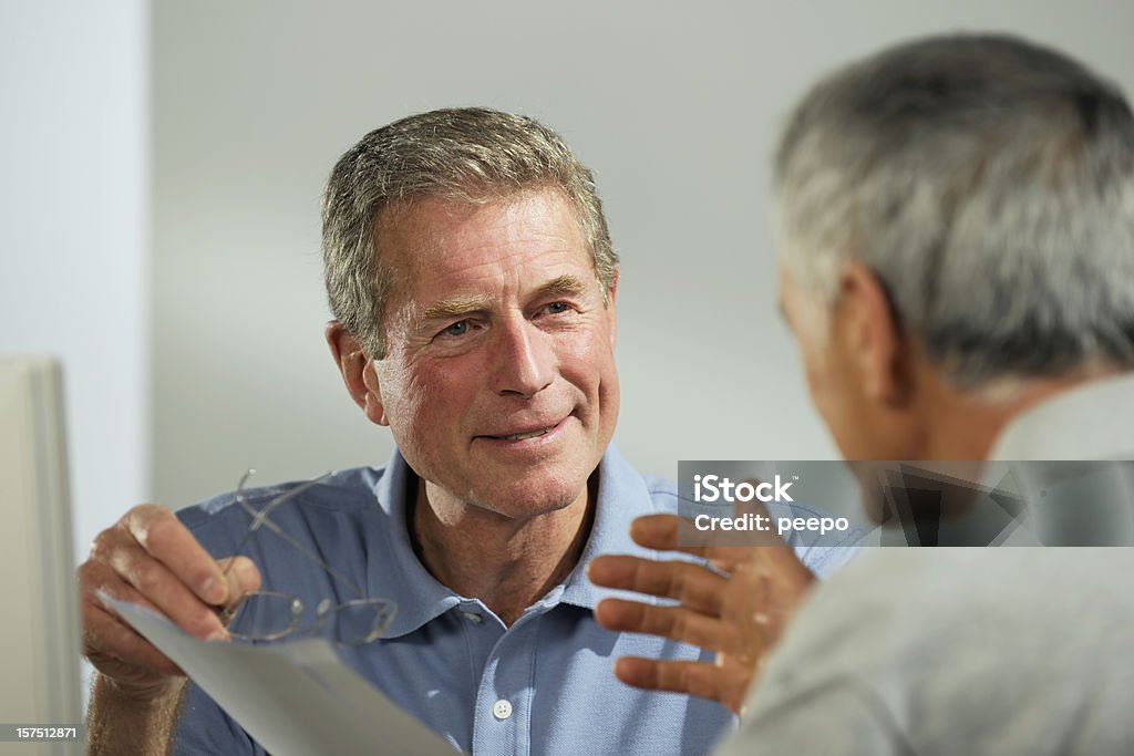 Uomini d'affari vestiti in stile casual - Foto stock royalty-free di 60-69 anni