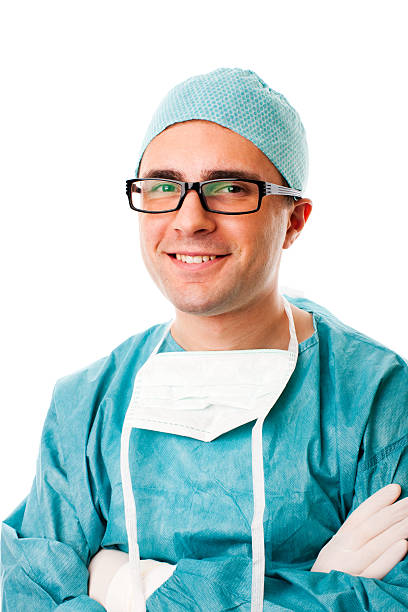 istock Male Surgeon Standing with Arms Crossed, Studio Portrait 157512918