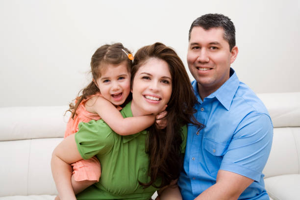 istock Happy Hispanic Family of three 157512990