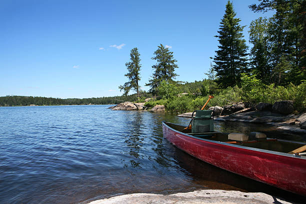 istock Canoe on Wilderness Lake 157522198