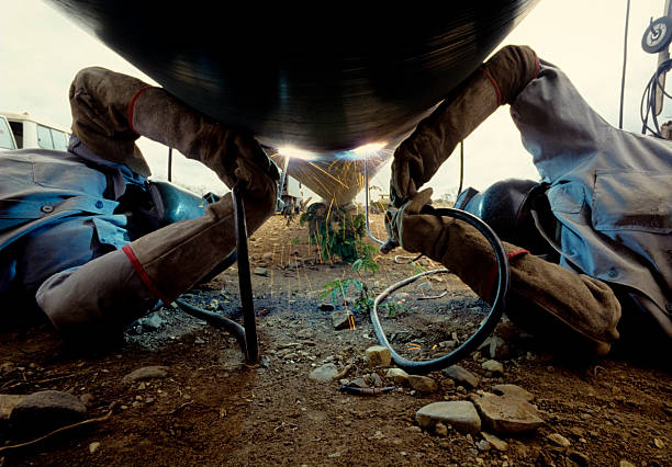 arc welders at work stock photo