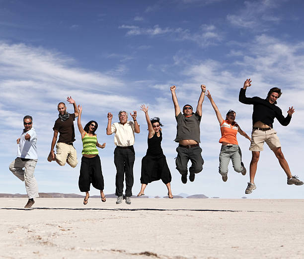 istock Jumping happy people 157522754