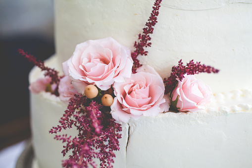 Close-ups and full frame pictures of different style wedding cakes