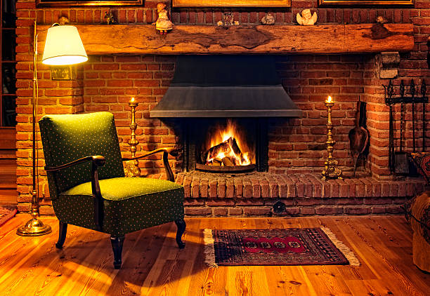 Fireplace Living room with fireplace warming up stock pictures, royalty-free photos & images