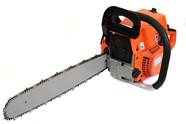 Chainsaw  chainsaw stock pictures, royalty-free photos & images