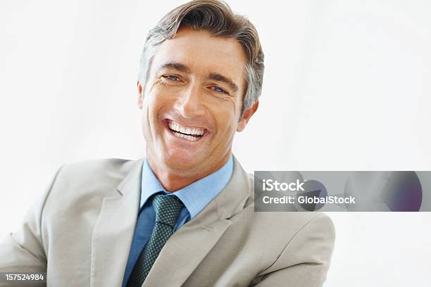 Portrait Of A Businessman Laughing Stock Photo - Download Image Now - 40-44 Years, 40-49 Years, Adult