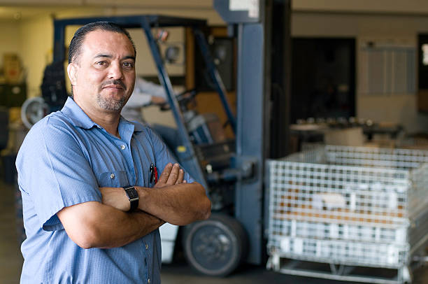 Latin, Hispanic, Male Warehouse Employee stock photo